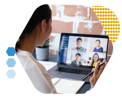 Lady holding a a conference call with customers via a laptop computer